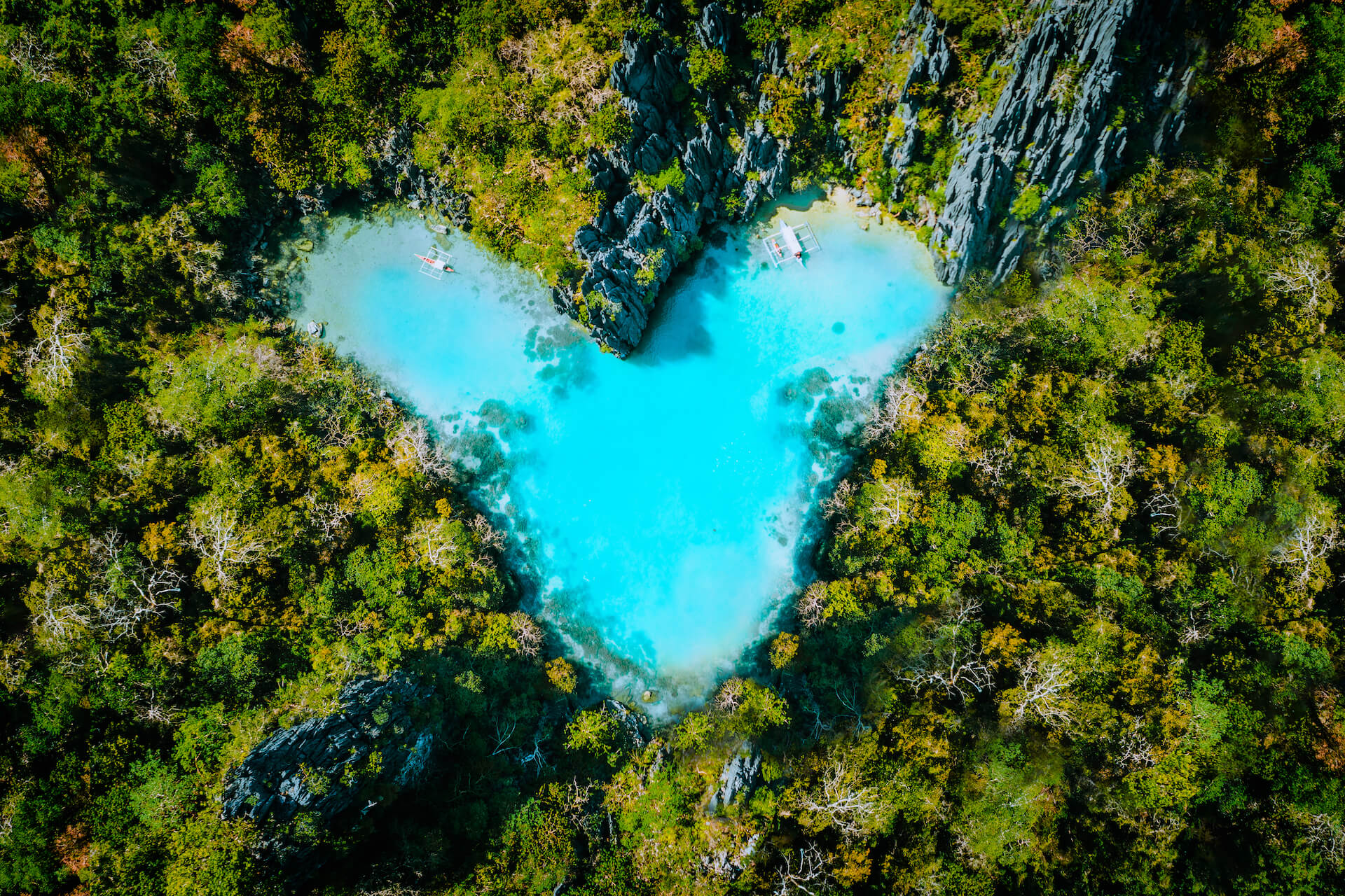 aerial-top-view-of-turquoise-lagoon-shaped-heart-i-2021-08-26-20-17-22-utc.jpg