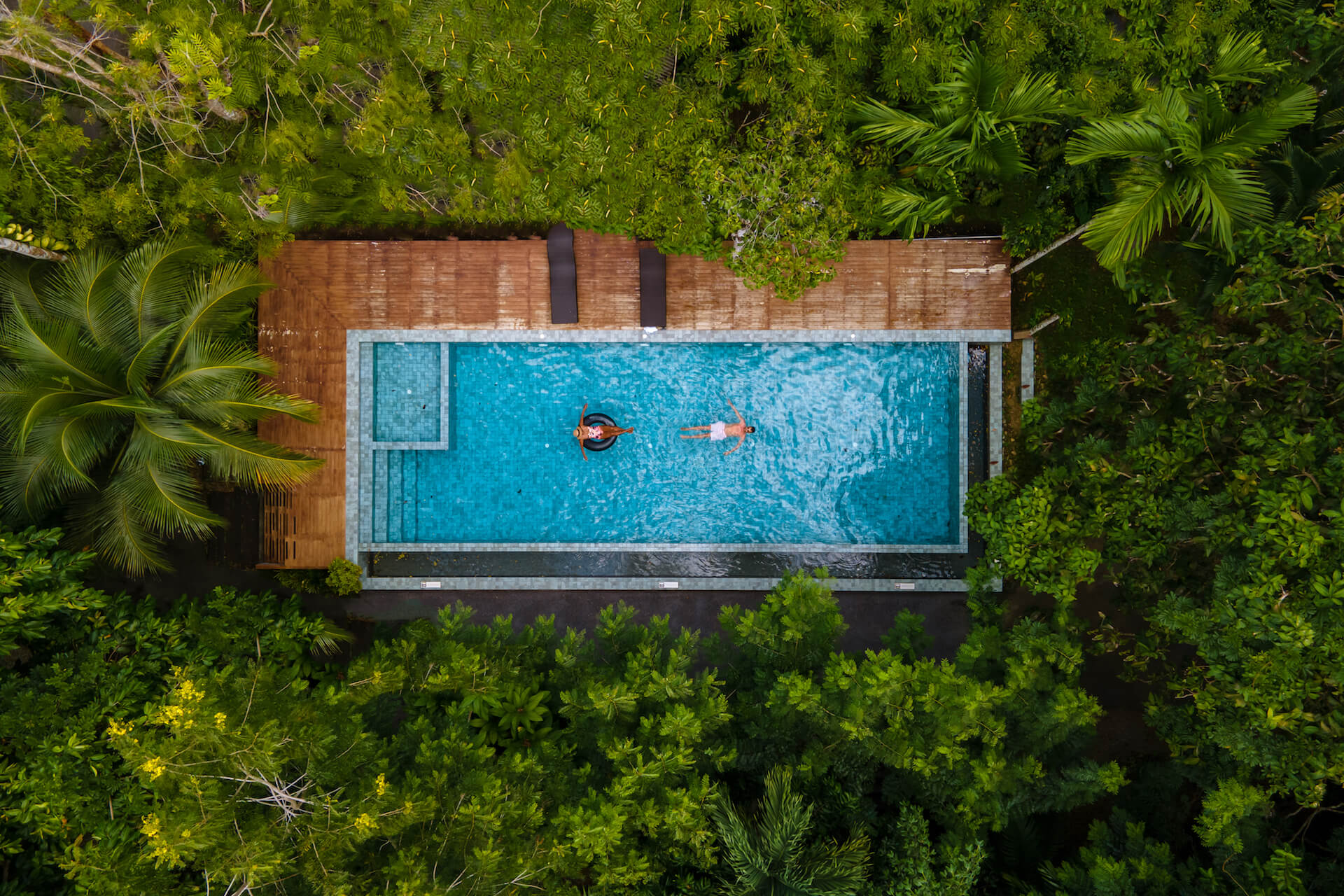 aerial-view-of-swimming-pool-in-the-jungle-of-krab-2022-07-01-03-53-25-utc.jpg